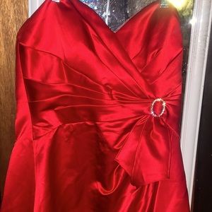 Red form fitting satin dress